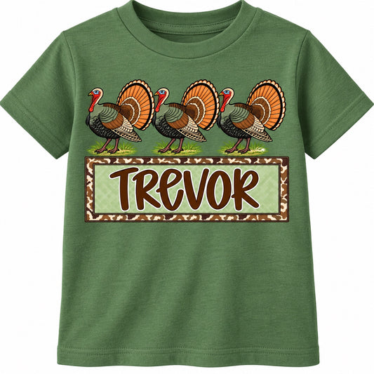Green kids turkey shirt featuring three turkeys and Trevor name